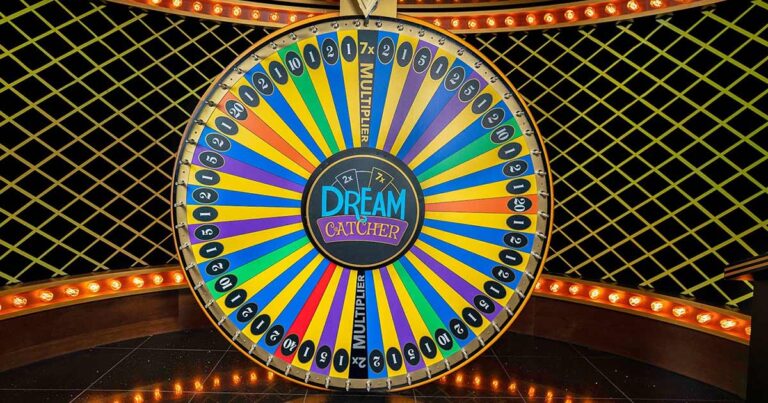 Dream Catcher Casino Game by Evolution Gaming featuring a colorful live money wheel with multipliers and a dealer host.