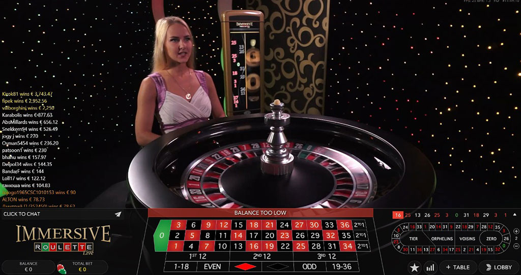 Live dealer hosting Immersive Roulette by Evolution Gaming, showing real roulette wheel and HD streaming setup.